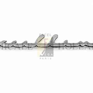 Excellence console badge, chrome-plated (used)